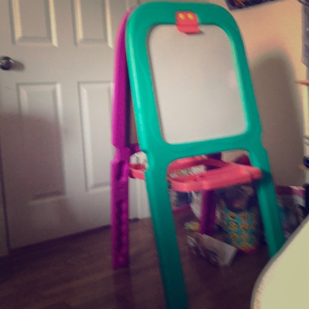 I am selling a whiteboard with a chalkboard behind